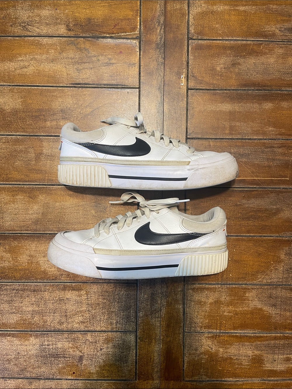 Nike Cream Platform Sneakers with Black Swoosh